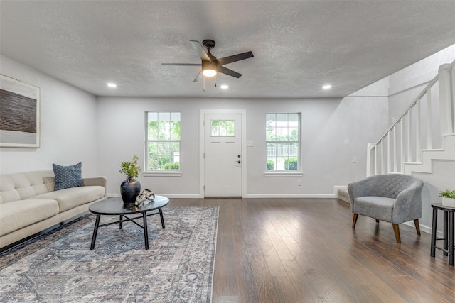 3321 NW 31st St, Fort Worth, TX 76106 - living area featuring a textured ceiling, ceiling fan, dark wood-style flooring, stairway, and recessed lighting