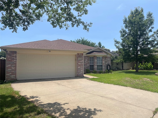 5907 Aloe Ct, Arlington, TX 76017 - single story home featuring brick siding, a front lawn, concrete driveway, and an attached garage