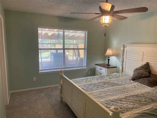 5907 Aloe Ct, Arlington, TX 76017 - carpeted bedroom featuring a textured ceiling and ceiling fan