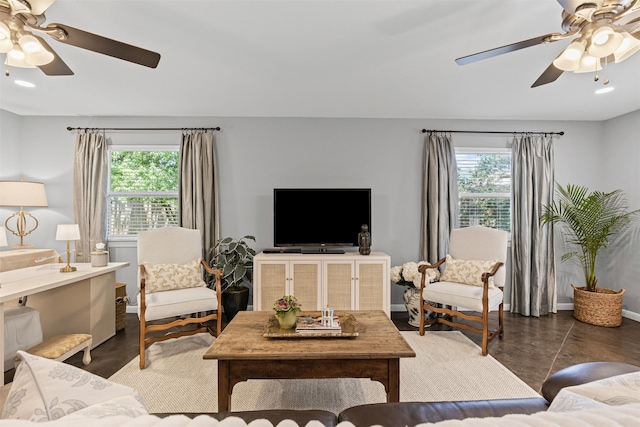 4304 Warnock Ct, Fort Worth, TX 76109 - living room with ceiling fan, plenty of natural light, baseboards, and finished concrete floors