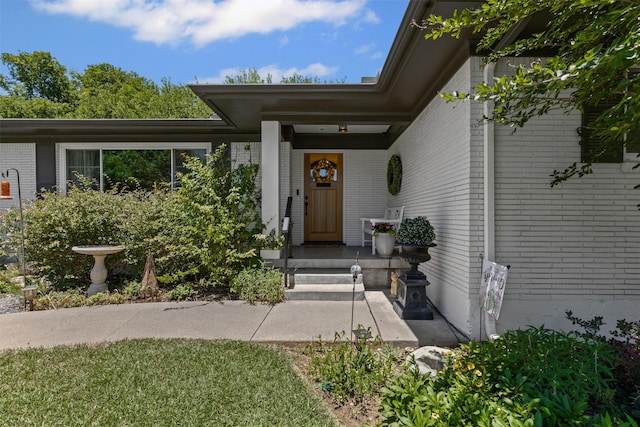 4304 Warnock Ct, Fort Worth, TX 76109 - view of exterior entry featuring brick siding