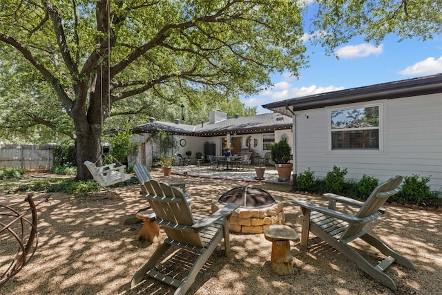 4304 Warnock Ct, Fort Worth, TX 76109 - view of patio / terrace with an outdoor fire pit