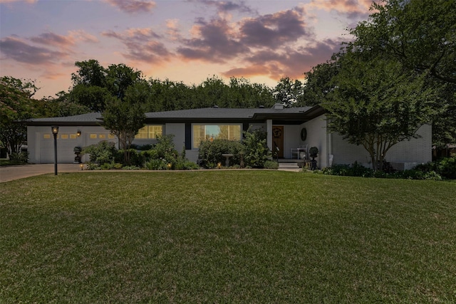 4304 Warnock Ct, Fort Worth, TX 76109 - view of front of property with a lawn, an attached garage, concrete driveway, and a chimney
