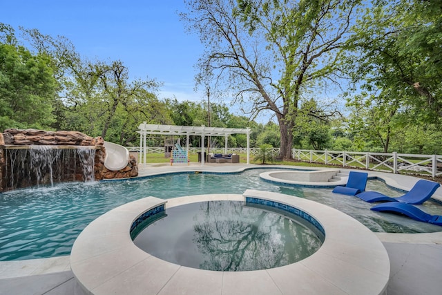 1015 S Lowrance Rd, Pecan Hill, TX 75154 - view of pool with a pool with connected hot tub, a fenced backyard, a pergola, and view of scattered trees
