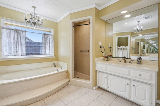 906 Greenbriar Ln, Duncanville, TX 75137 - bathroom featuring a chandelier, ornamental molding, a garden tub, vanity, and tile patterned flooring