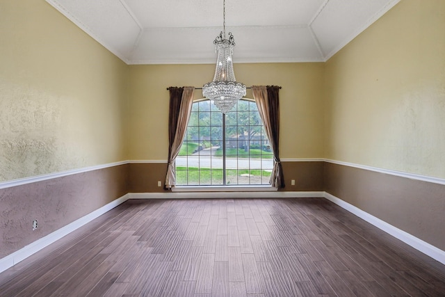 906 Greenbriar Ln, Duncanville, TX 75137 - empty room with a chandelier, dark wood-style floors, vaulted ceiling, crown molding, and baseboards