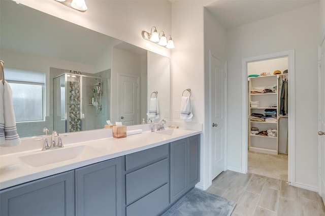 7200 Paso Verde Dr, Fort Worth, TX 76131 - bathroom with a shower stall, double vanity, and a spacious closet