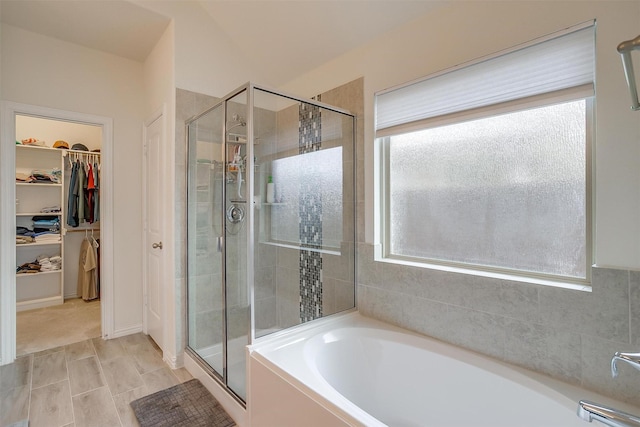 7200 Paso Verde Dr, Fort Worth, TX 76131 - bathroom featuring healthy amount of natural light, a bath, and a shower stall