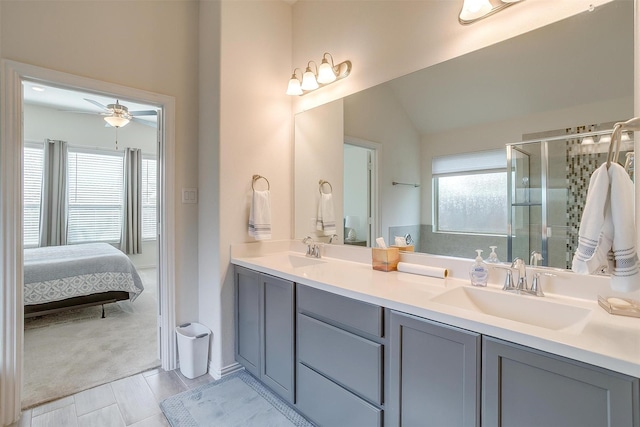 7200 Paso Verde Dr, Fort Worth, TX 76131 - ensuite bathroom with double vanity, a stall shower, and a ceiling fan