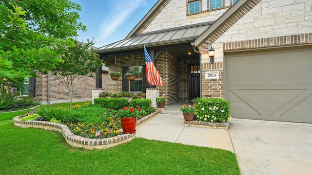 2813 Chestnut Ln, Melissa, TX 75454 - entrance to property with a standing seam roof, brick siding, a yard, and concrete driveway