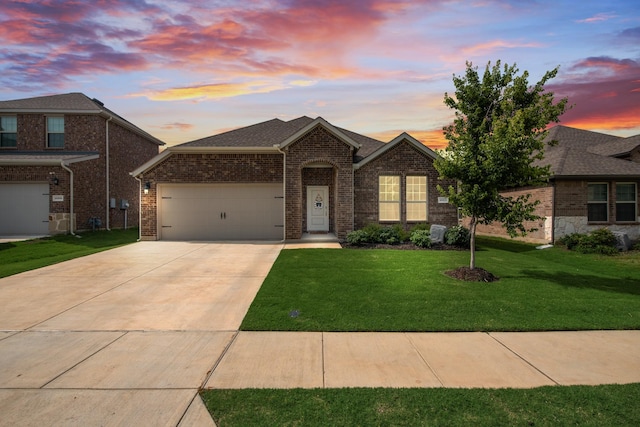 10213 Plumlee Ln, Aubrey, TX 76227 - view of front facade featuring a garage, brick siding, concrete driveway, a front lawn, and roof with shingles