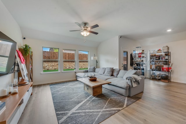 10213 Plumlee Ln, Aubrey, TX 76227 - living room featuring a ceiling fan, wood finished floors, baseboards, and lofted ceiling