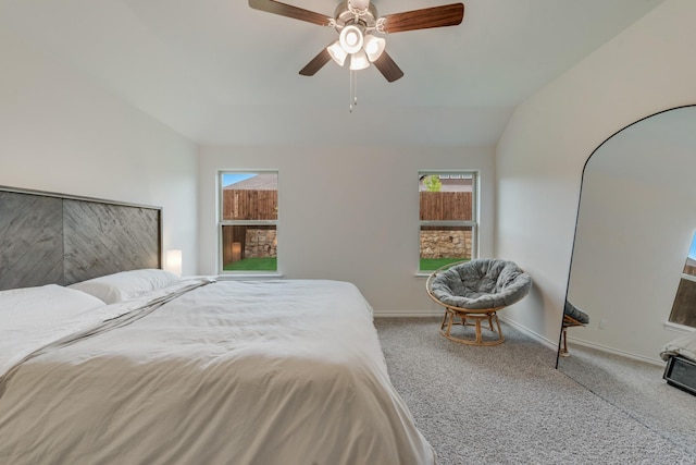 10213 Plumlee Ln, Aubrey, TX 76227 - carpeted bedroom with multiple windows, baseboards, lofted ceiling, and a ceiling fan
