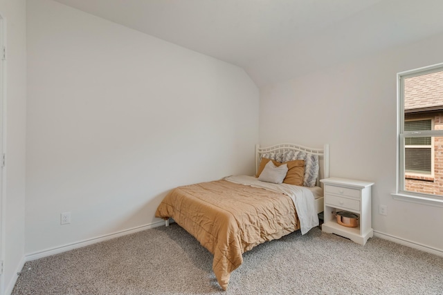 10213 Plumlee Ln, Aubrey, TX 76227 - bedroom featuring light carpet, lofted ceiling, and baseboards