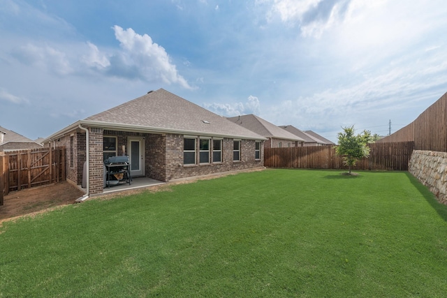 10213 Plumlee Ln, Aubrey, TX 76227 - back of house featuring brick siding, a shingled roof, and a patio