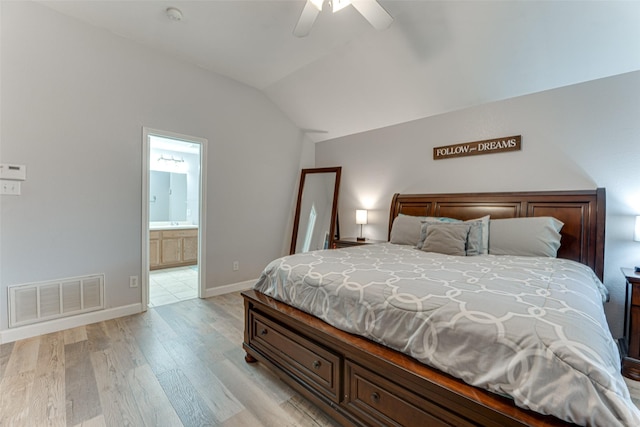 1900 Clear Creek Dr, Little Elm, TX 75068 - bedroom with light wood-type flooring, vaulted ceiling, ensuite bath, a ceiling fan, and baseboards