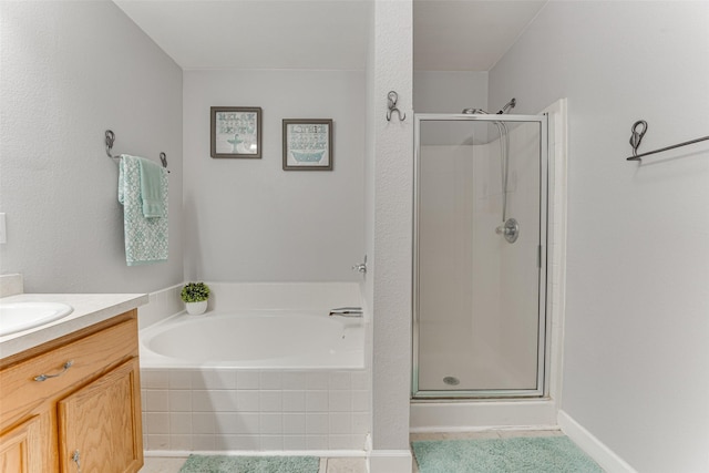 1900 Clear Creek Dr, Little Elm, TX 75068 - full bath featuring a shower stall, a bath, vanity, and tile patterned floors