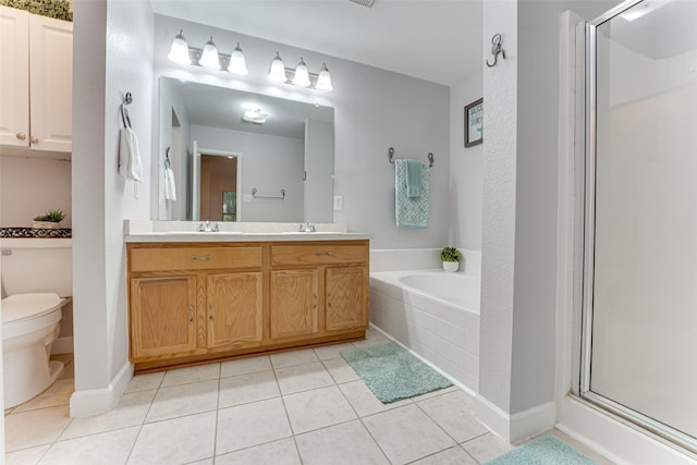 1900 Clear Creek Dr, Little Elm, TX 75068 - full bathroom with double vanity, tile patterned floors, a garden tub, and a stall shower