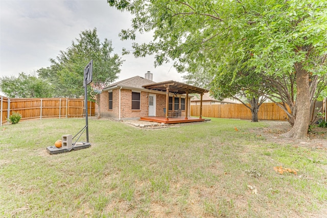 1900 Clear Creek Dr, Little Elm, TX 75068 - back of house with a deck, a chimney, and brick siding