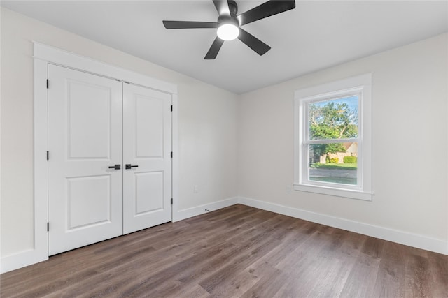 3408 Medallion Cir, Waco, TX 76706 - unfurnished bedroom with baseboards, wood finished floors, a closet, and ceiling fan