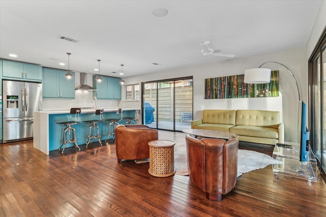 133 Lakeridge Dr, Dallas, TX 75218 - living area with dark wood-style floors and recessed lighting