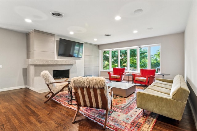 133 Lakeridge Dr, Dallas, TX 75218 - living room featuring dark wood-type flooring, recessed lighting, and a fireplace