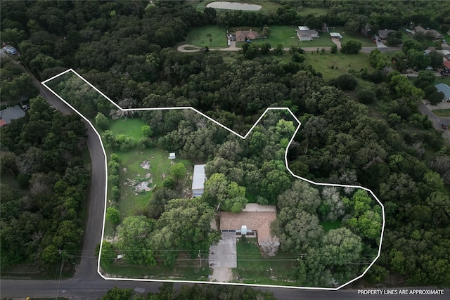 607 Audrey Ave, Waco, TX 76705 - aerial view of property's location featuring property boundaries highlighted and a heavily wooded area