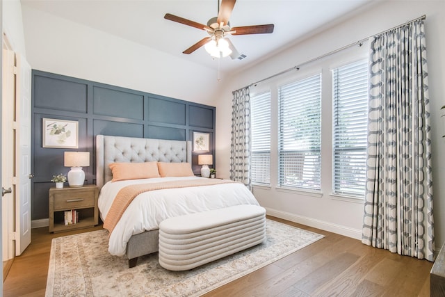 3717 Silver Birch Dr, Mckinney, TX 75071 - bedroom with multiple windows, wood finished floors, and baseboards