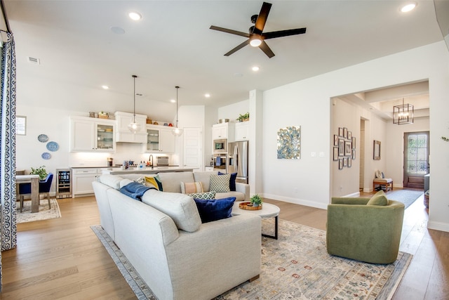3717 Silver Birch Dr, Mckinney, TX 75071 - living room with ceiling fan, light wood finished floors, recessed lighting, and baseboards