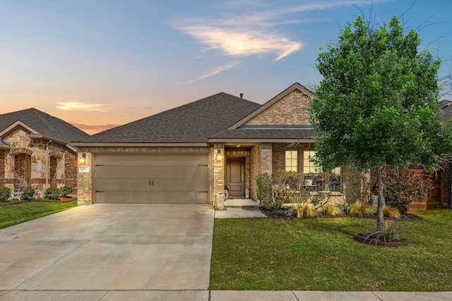 11013 Cobalt Dr, Aubrey, TX 76227 - craftsman house with brick siding, concrete driveway, an attached garage, and a front lawn