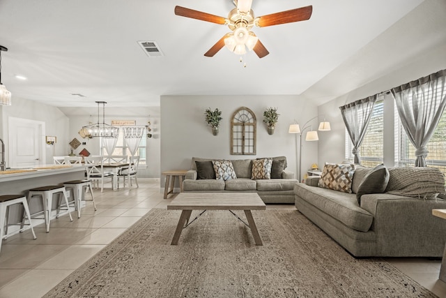 11013 Cobalt Dr, Aubrey, TX 76227 - living room featuring light tile patterned floors and ceiling fan