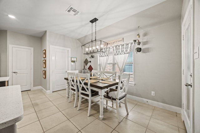 11013 Cobalt Dr, Aubrey, TX 76227 - dining room featuring light tile patterned flooring, a chandelier, and baseboards