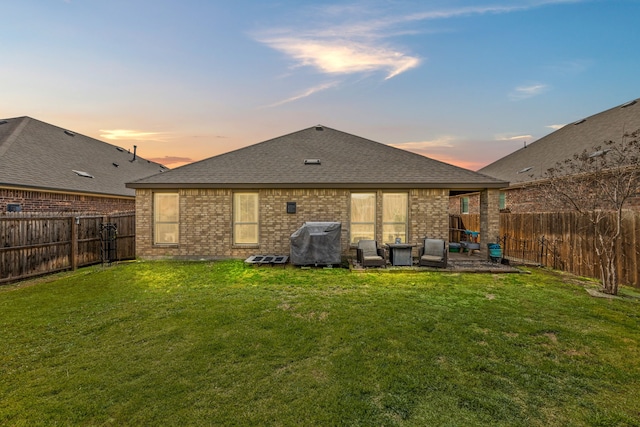 11013 Cobalt Dr, Aubrey, TX 76227 - back of property with brick siding, roof with shingles, and a patio area