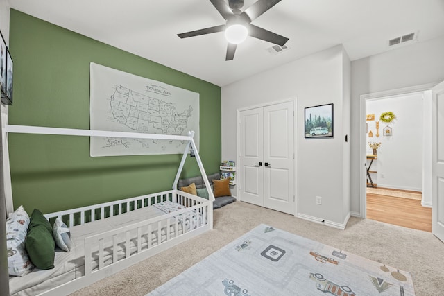 1224 Caprock Dr, Forney, TX 75126 - carpeted bedroom with a ceiling fan and a closet