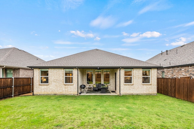 1224 Caprock Dr, Forney, TX 75126 - rear view of property featuring a fenced backyard, a ceiling fan, a patio area, brick siding, and an outdoor hangout area