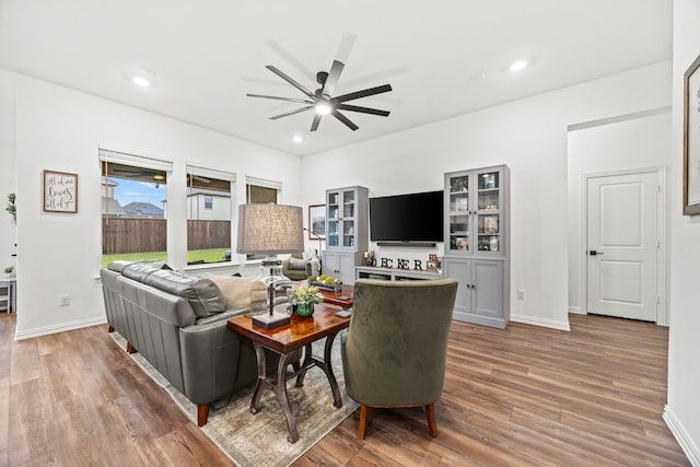 1224 Caprock Dr, Forney, TX 75126 - living area featuring ceiling fan, wood finished floors, and recessed lighting