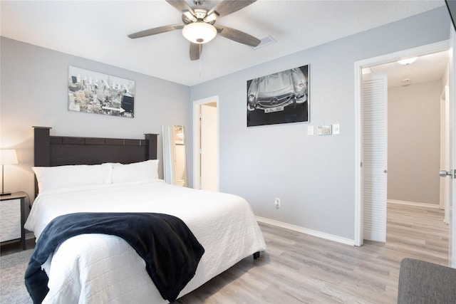 8713 Sabinas Trl, Fort Worth, TX 76118 - bedroom featuring baseboards, light wood-type flooring, and a ceiling fan