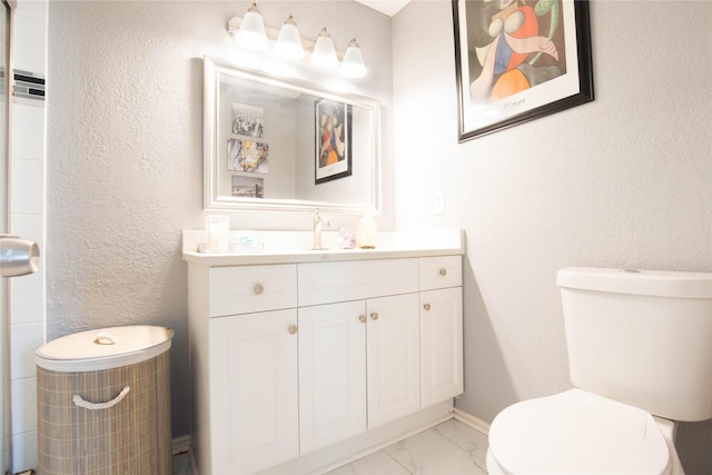 8713 Sabinas Trl, Fort Worth, TX 76118 - bathroom with toilet, marble finish floors, vanity, and a textured wall