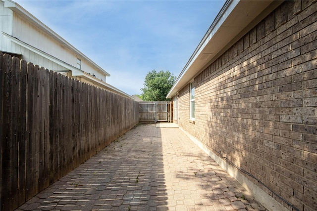 8713 Sabinas Trl, Fort Worth, TX 76118 - view of home's exterior featuring a patio area