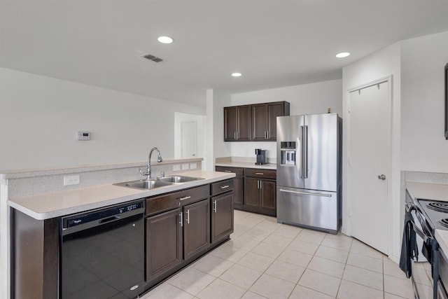 4506 Maplewood Ave, Balch Springs, TX 75180 - kitchen with black appliances, a sink, dark brown cabinets, light countertops, and recessed lighting