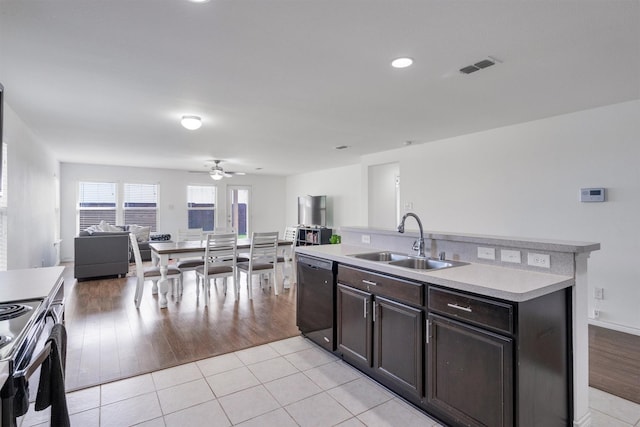 4506 Maplewood Ave, Balch Springs, TX 75180 - kitchen featuring black appliances, a sink, open floor plan, a ceiling fan, and light countertops