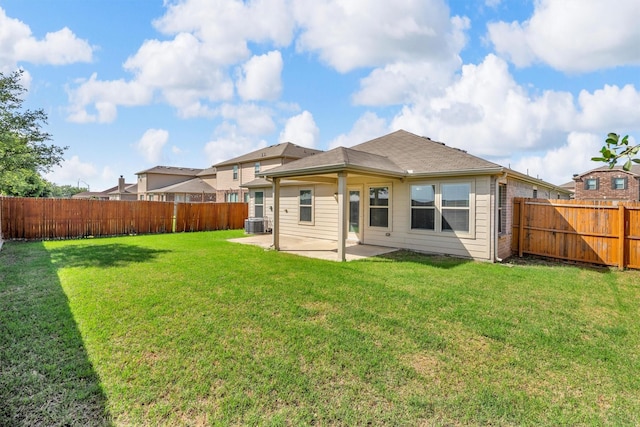 4506 Maplewood Ave, Balch Springs, TX 75180 - back of property with a patio area and cooling unit