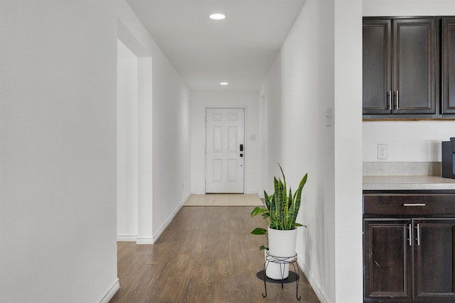 4506 Maplewood Ave, Balch Springs, TX 75180 - corridor featuring wood finished floors, recessed lighting, and baseboards