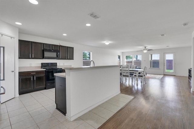 4506 Maplewood Ave, Balch Springs, TX 75180 - kitchen featuring black appliances, plenty of natural light, light countertops, recessed lighting, and a ceiling fan