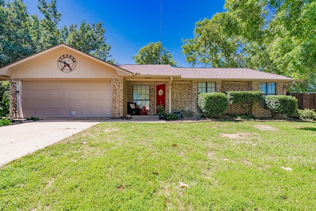 2120 Lisa Cir, Canton, TX 75103 - single story home featuring a garage, brick siding, and concrete driveway