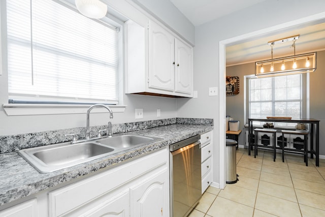 2120 Lisa Cir, Canton, TX 75103 - kitchen featuring dishwasher, a sink, light tile patterned floors, white cabinets, and healthy amount of natural light