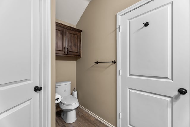 105 Mission Crest Cir, Lindale, TX 75771 - bathroom featuring wood finished floors, baseboards, toilet, and lofted ceiling