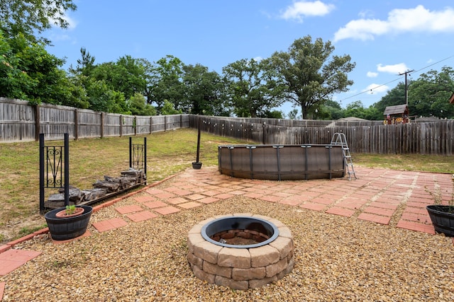 105 Mission Crest Cir, Lindale, TX 75771 - view of patio / terrace featuring a fire pit