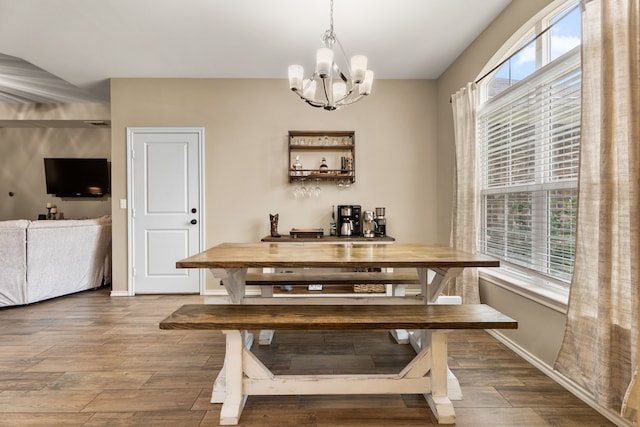 105 Mission Crest Cir, Lindale, TX 75771 - dining room with a chandelier, wood finished floors, and baseboards