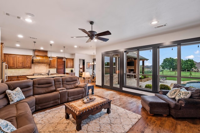 215 Thornhill Cir, Double Oak, TX 75077 - living room with recessed lighting, ceiling fan, and light wood finished floors